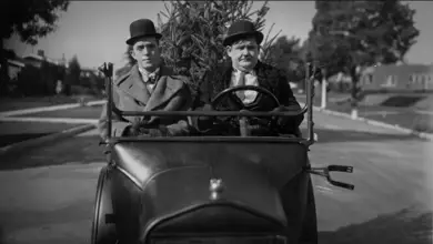 Photo of Laurel and Hardy in “The Second Hundred Years” (1927). It begins